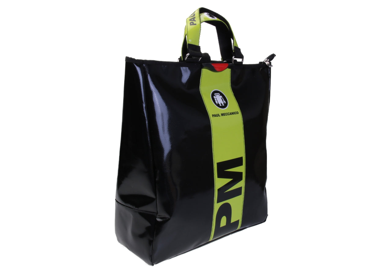 2 IN 1 BRIEFCASE AND BACKPACK IN BLACK AND FLUORESCENT GREEN. MODEL HYBRID MADE OF LORRY TARPAULIN.