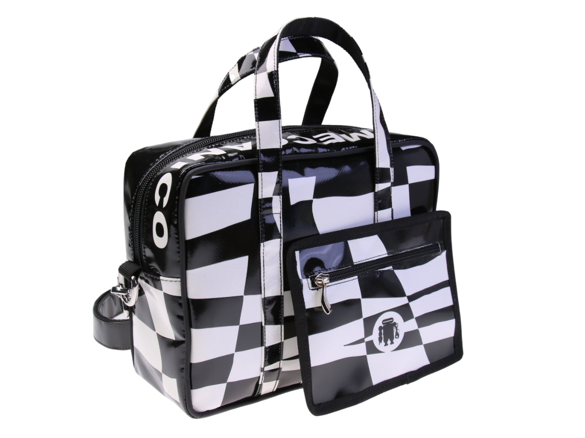 ....BLACK AND WHITE RECTANGULAR WOMEN&#39;S BAG. MODEL PINCA MADE OF LORRY TARPAULIN.