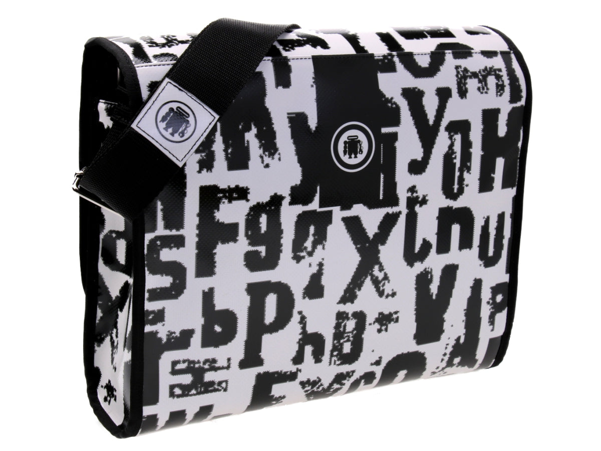 BLACK AND WHITE CROSSBODY BAG WITH LETTER FANTASY. MODEL BREAK MADE OF LORRY TARPAULIN.