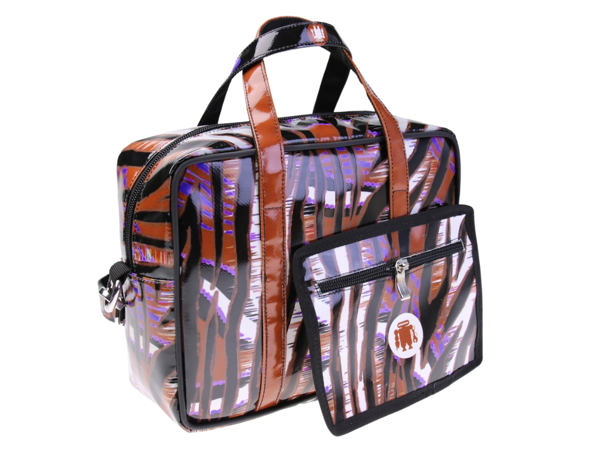 ....RECTANGULAR WOMEN&#39;S BAG WITH ANIMALIER FANTASY. MODEL PINCA MADE OF LORRY TARPAULIN.