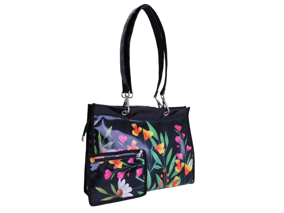 BLACK SHOPPER BAG WITH FLORAL FANTASY. MODEL PEPE MADE OF LORRY TARPAULIN.