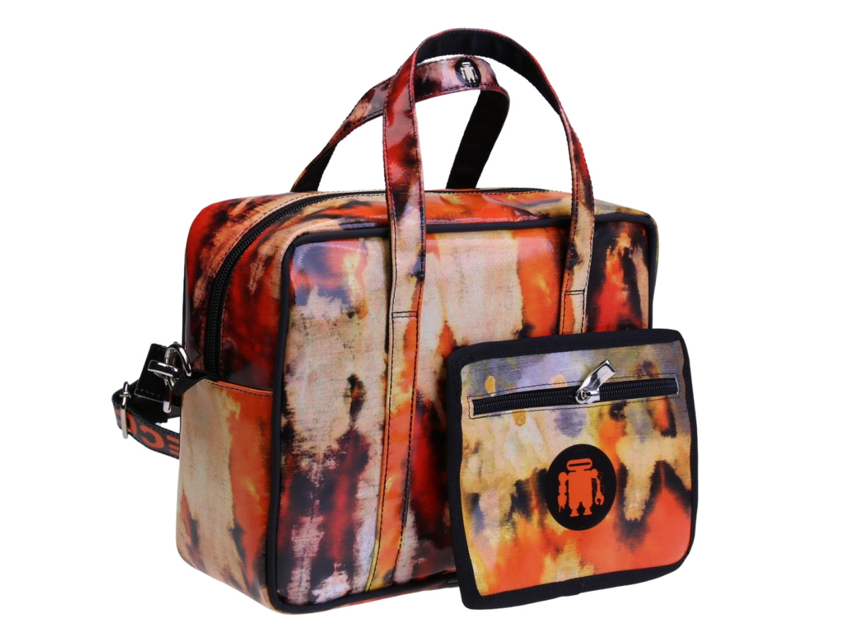 ....RECTANGULAR WOMEN&#39;S BAG WITH TIE DYE FANTASY. MODEL PINCA MADE OF LORRY TARPAULIN.