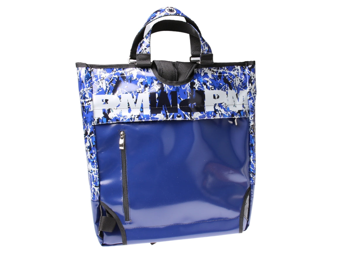 ...2 IN 1 BRIEFCASE AND BACKPACK IN BLUE COLOUR WITH CAMOUFLAGE FANTASY. MODEL HYBRID MADE OF LORRY TARPAULIN.