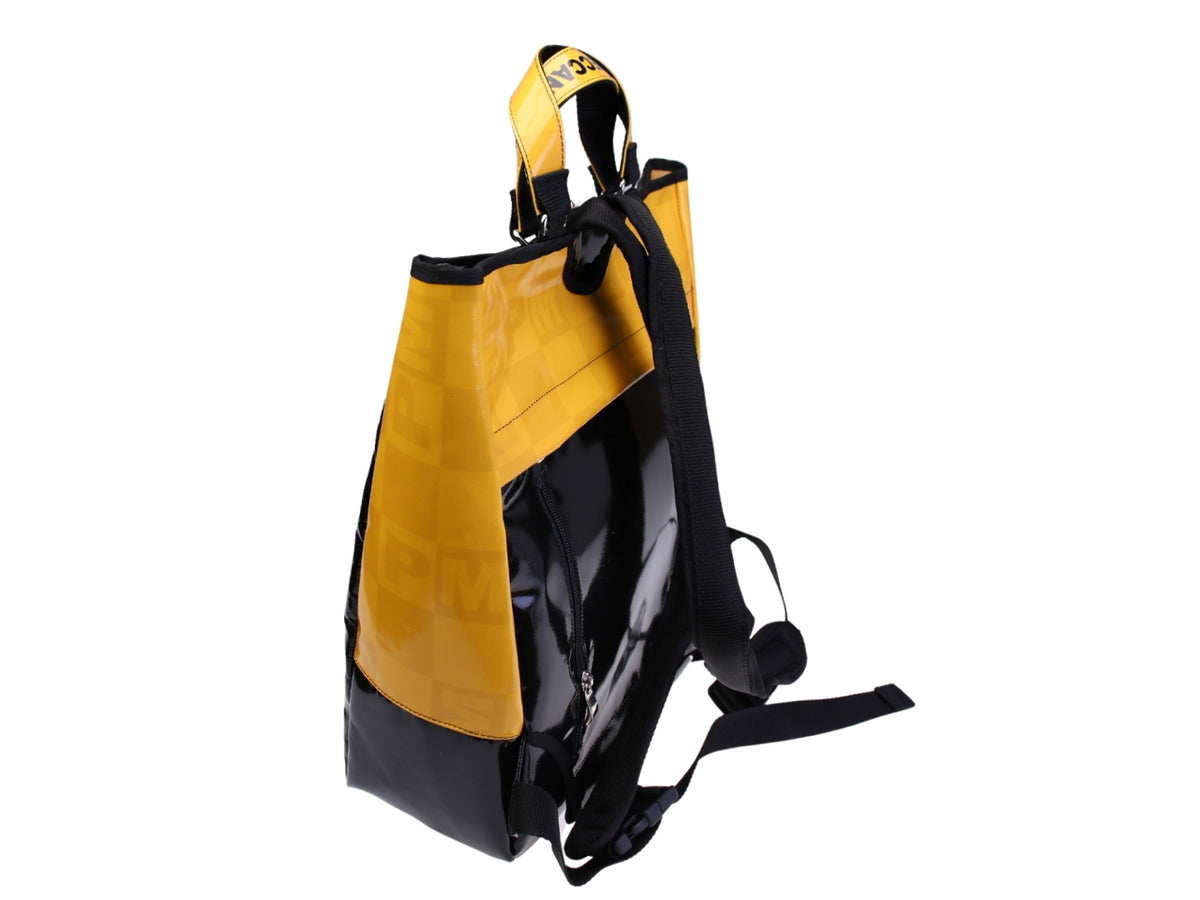 ...2 IN 1 BRIEFCASE AND BACKPACK IN BLACK AND YELLOW COLOURS. MODEL HYBRID MADE OF LORRY TARPAULIN.